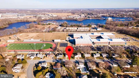 an aerial view of a houses with outdoor space