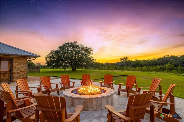 swimming pool with outdoor seating