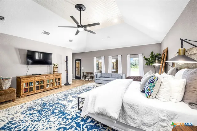 a living room with furniture and a table