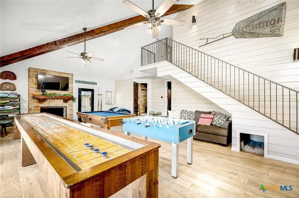 a very nice looking dining room with a table and chairs