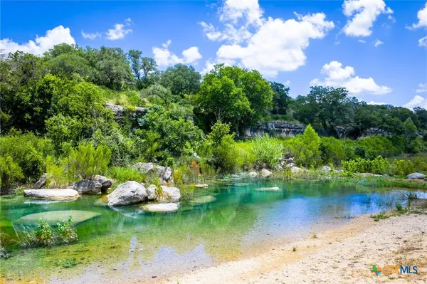 a view of a lake from a yard