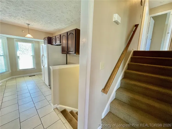 a bathroom with a toilet and shower