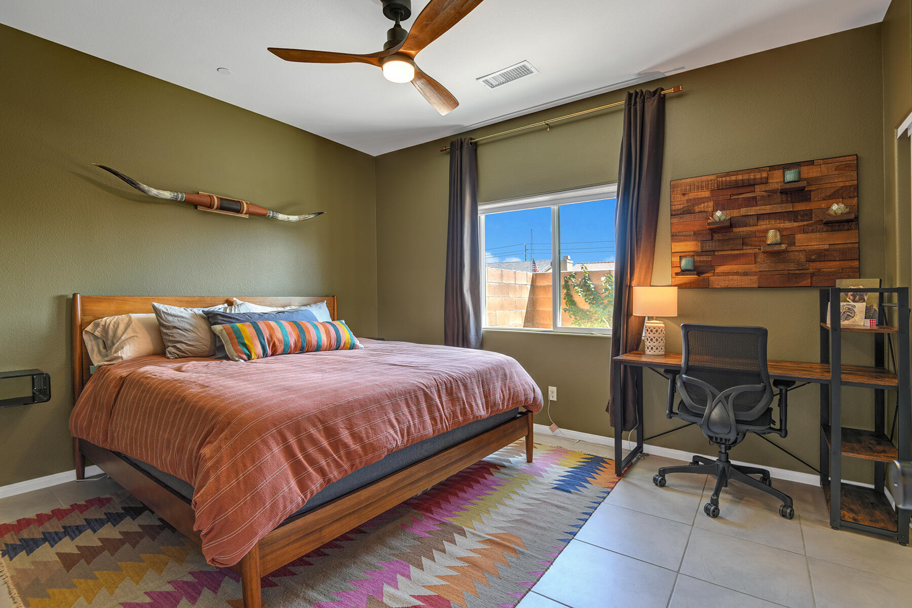 68965 Hermosillo Road Cathedral City, CA 92234 - Photo 19 of 40 a bedroom with a bed and a table