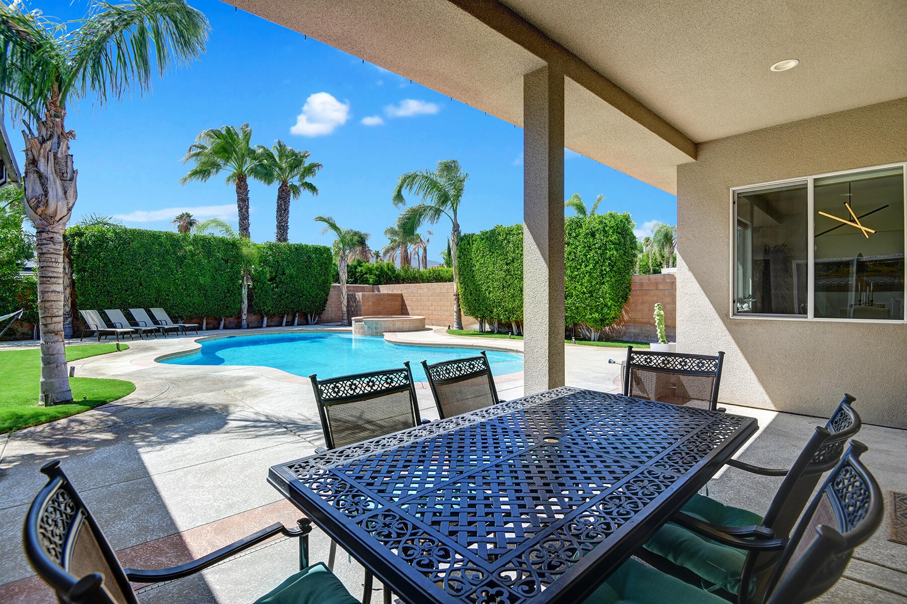 68965 Hermosillo Road Cathedral City, CA 92234 - Photo 28 of 40 a view of an outdoor sitting area with furniture
