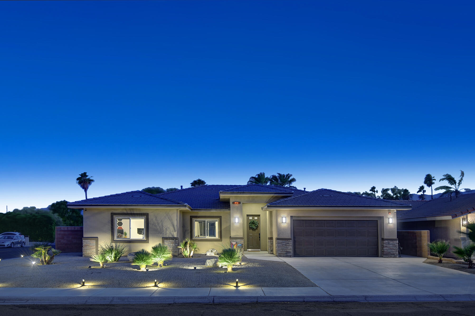 68965 Hermosillo Road Cathedral City, CA 92234 - Photo 31 of 40 a front view of a house with a garden and yard