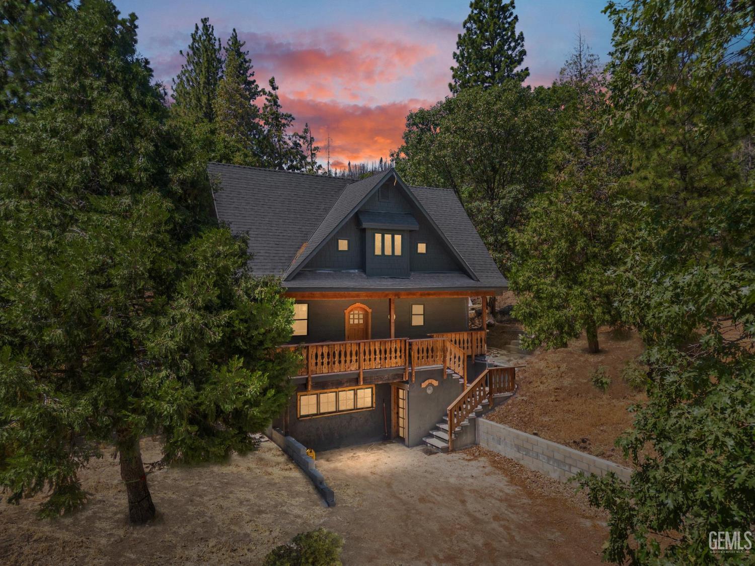 a view of a bench in the backyard