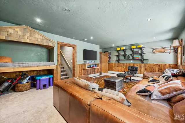 a very nice looking living room with furniture and a flat screen tv
