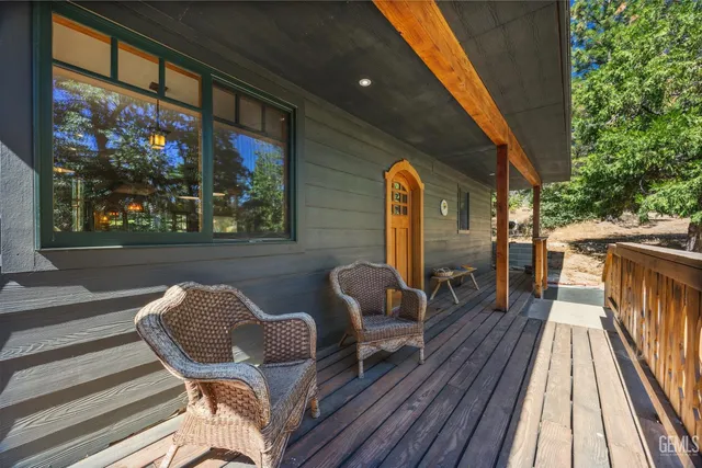 a view of balcony with furniture