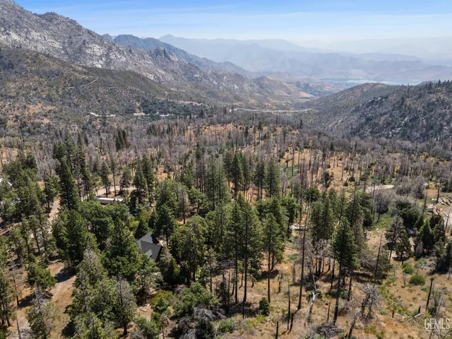 a view of a city with mountains in the background