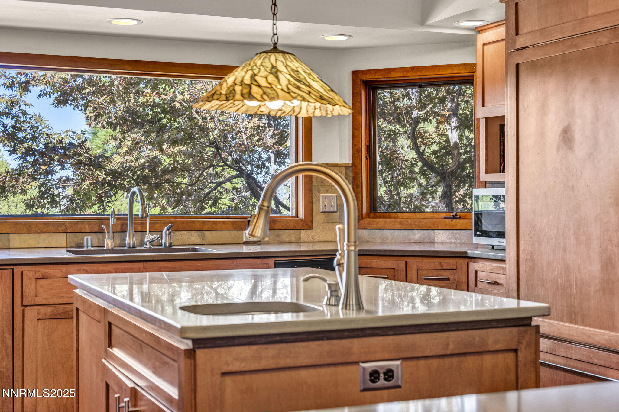 4283 Water Hole Road Reno, NV 89519 - Photo 14 of 62 a view of a room with a window and chandelier