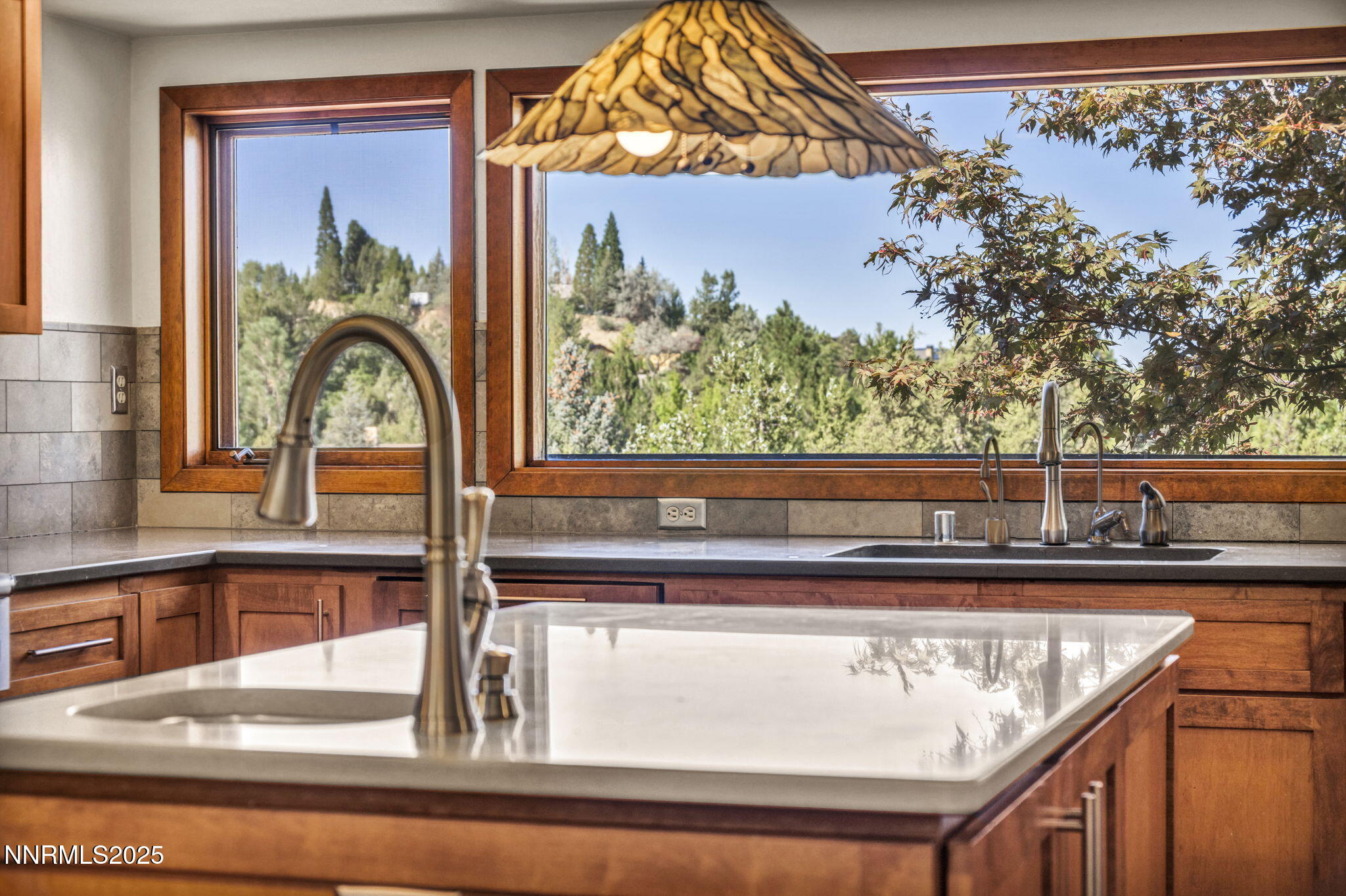 4283 Water Hole Road Reno, NV 89519 - Photo 15 of 62 a view of a sink with a close up of a mirror