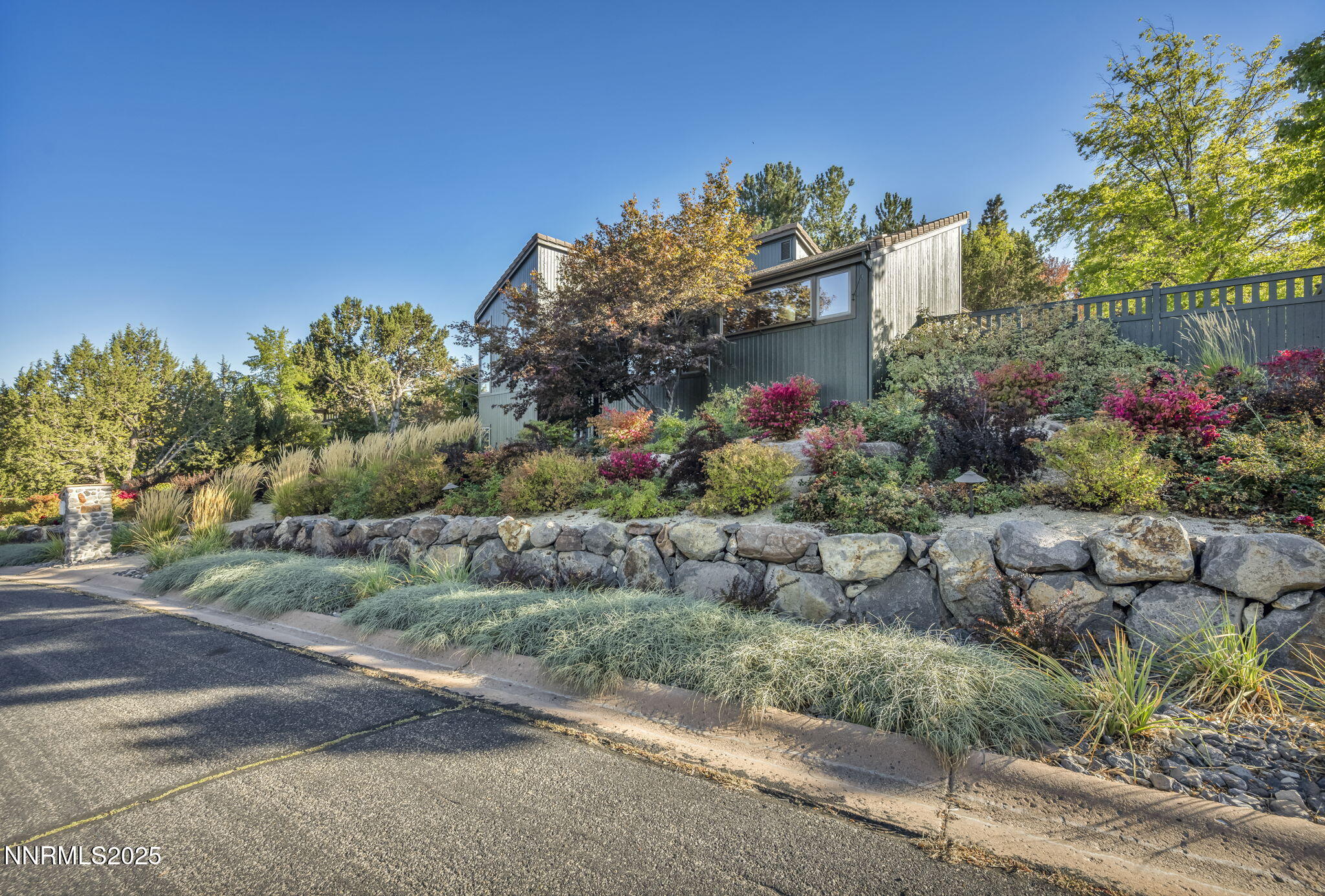 4283 Water Hole Road Reno, NV 89519 - Photo 2 of 62 a view of a garden with flowers