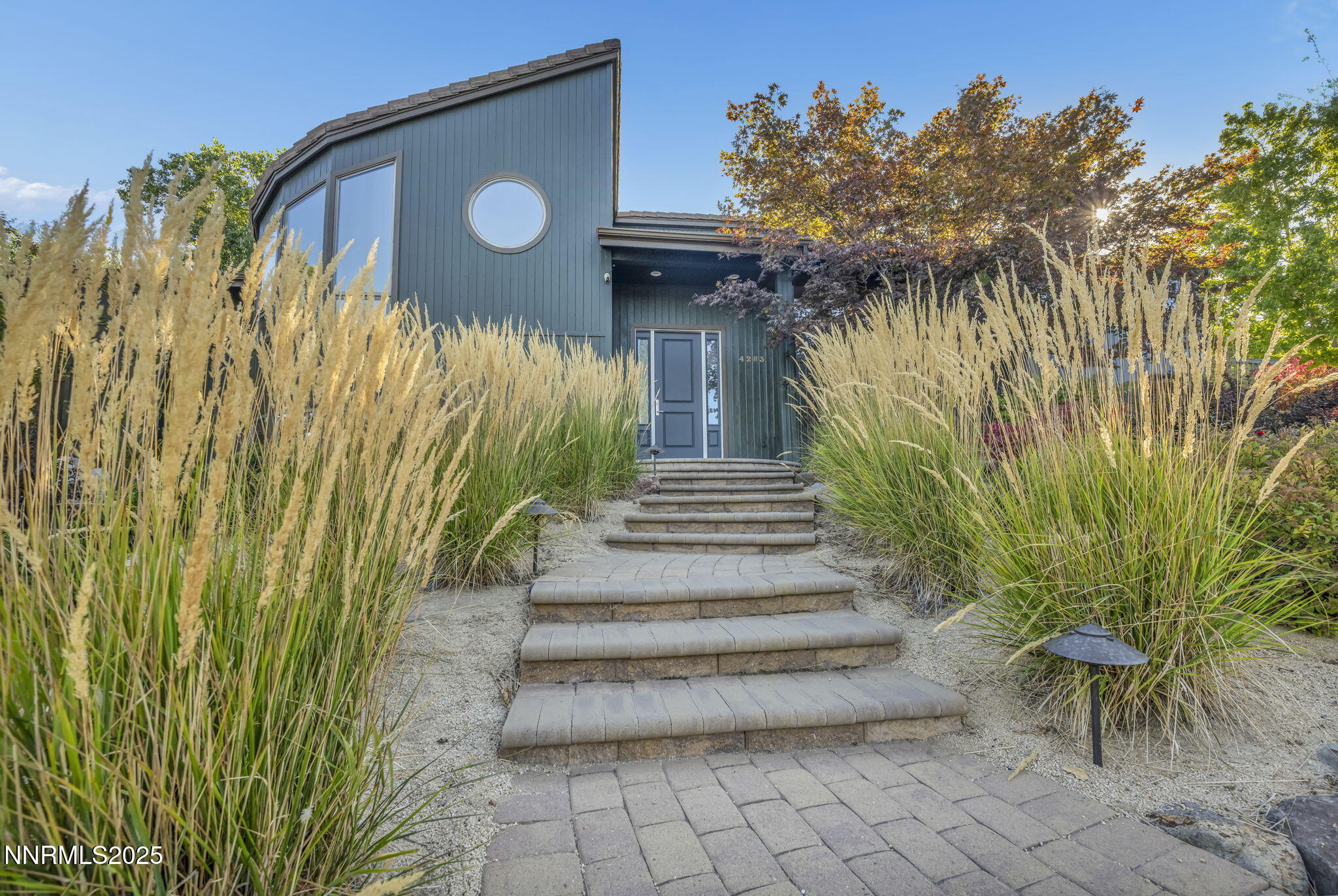 4283 Water Hole Road Reno, NV 89519 - Photo 3 of 62 a view of entryway with flower plants