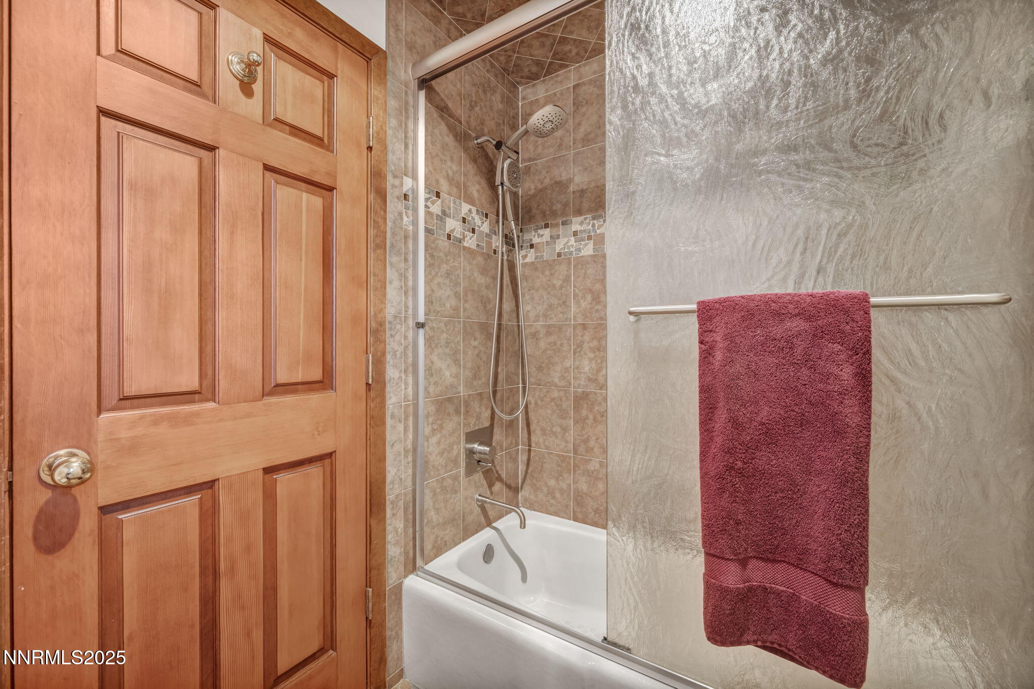 4283 Water Hole Road Reno, NV 89519 - Photo 36 of 62 a bathroom with a bathtub and shower