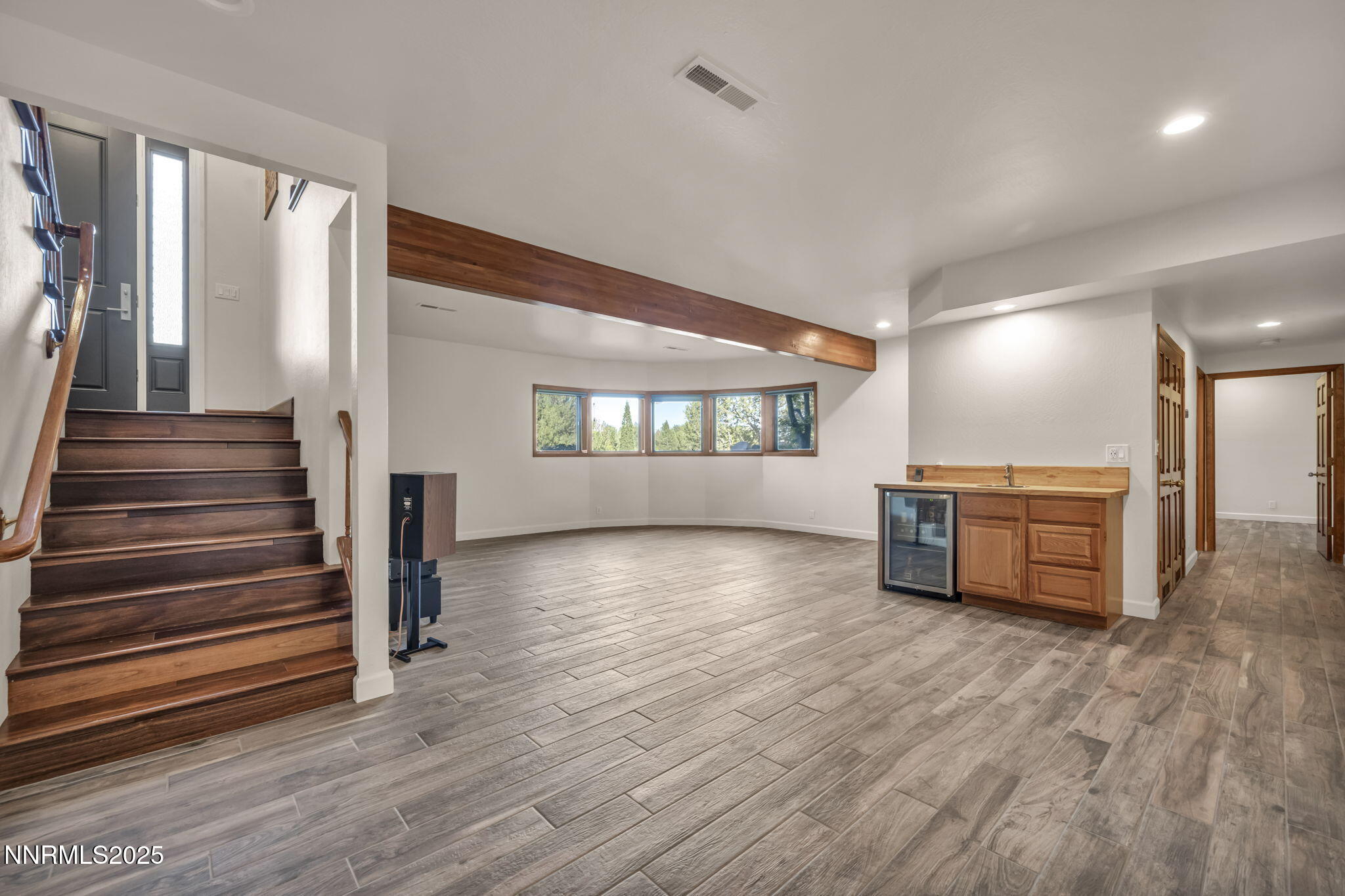 4283 Water Hole Road Reno, NV 89519 - Photo 38 of 62 a view of a room with entryway and wooden floor