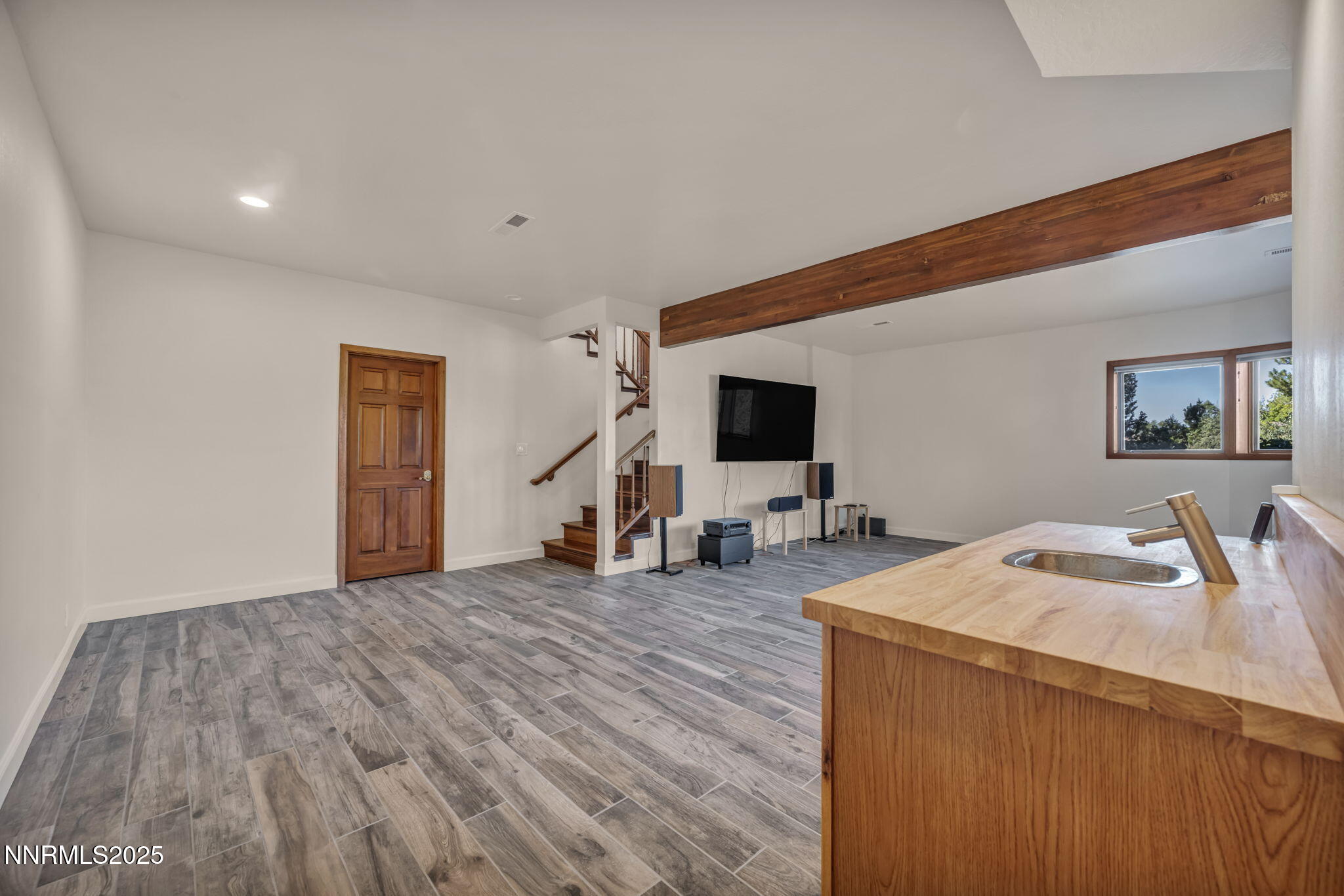 4283 Water Hole Road Reno, NV 89519 - Photo 42 of 62 a very nice looking room with a large bed and a flat screen tv