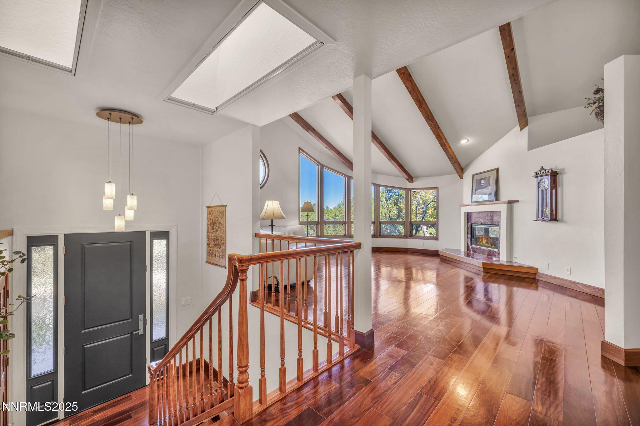 4283 Water Hole Road Reno, NV 89519 - Photo 5 of 62 a view of a hallway with wooden floor windows and entryway