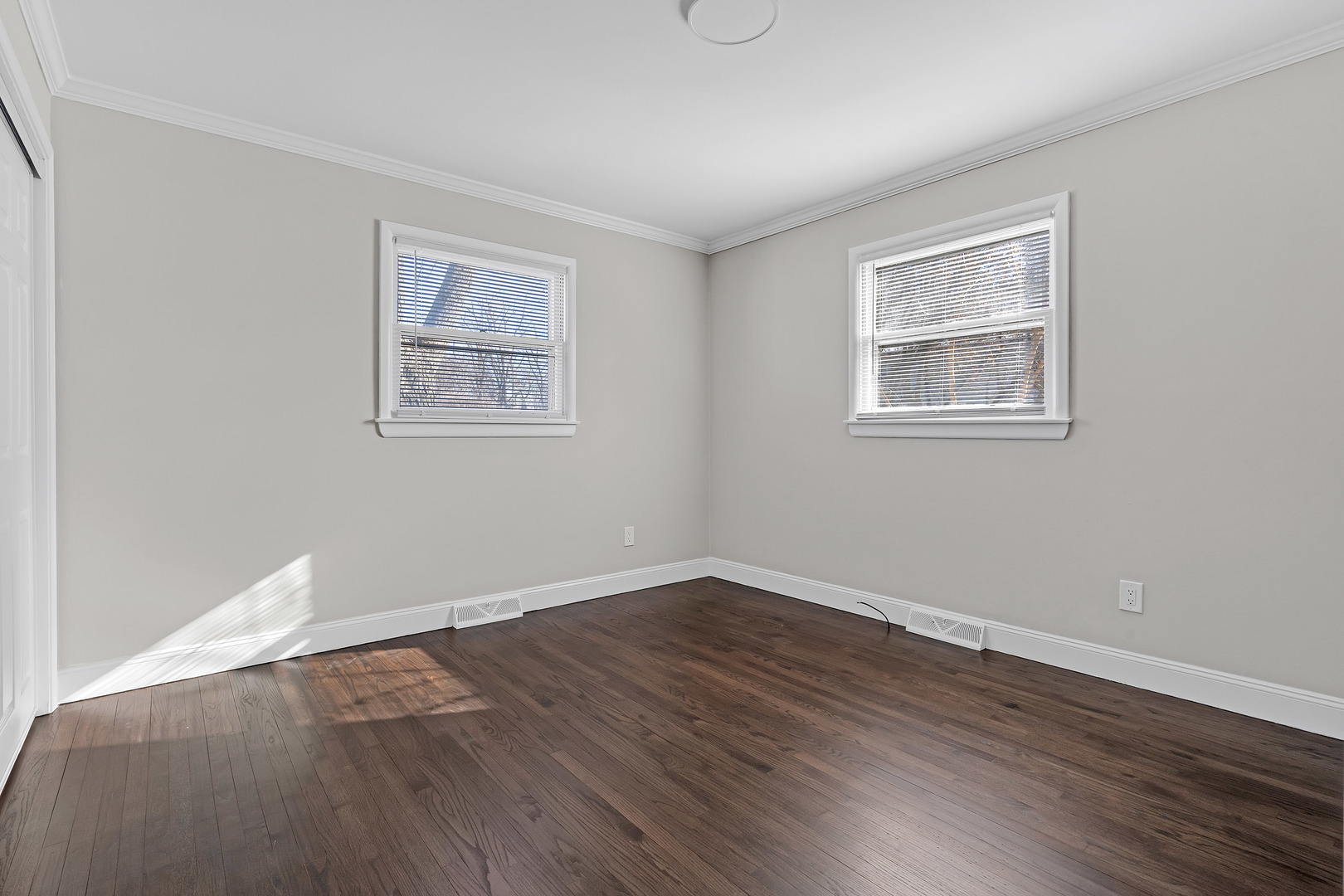 160 Marley Road New Lenox, IL 60451 - Photo 20 of 23 a view of an empty room with wooden floor and a window