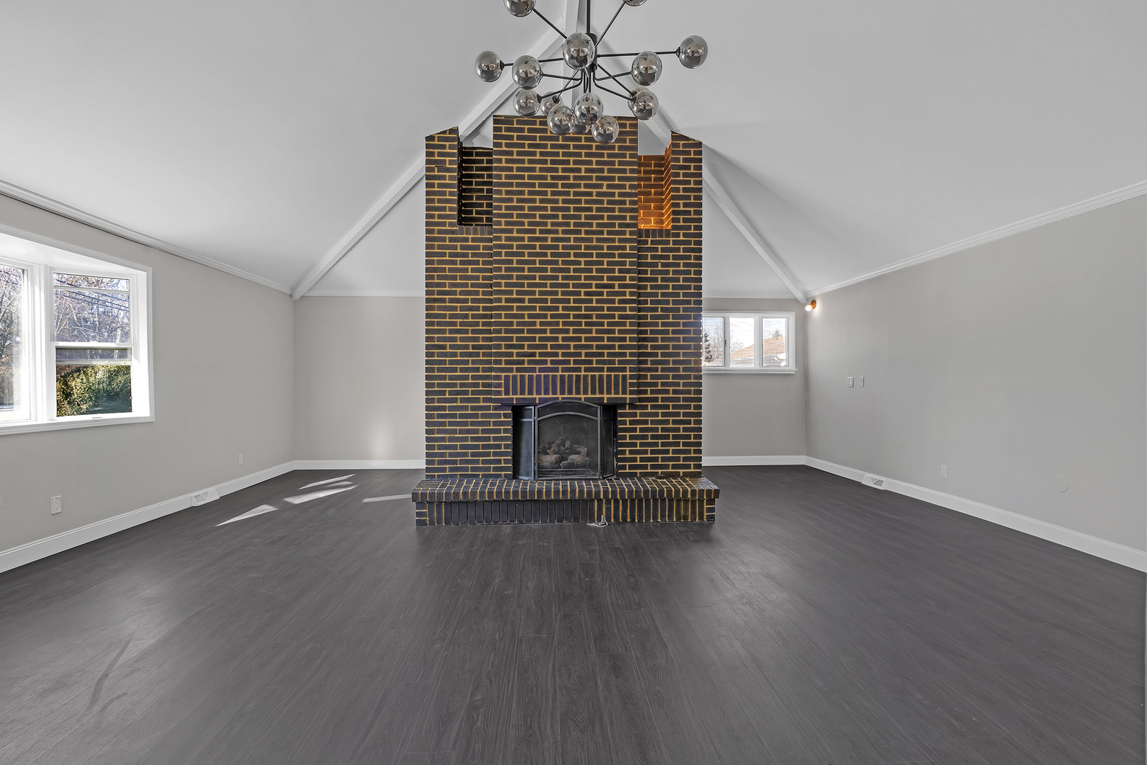 160 Marley Road New Lenox, IL 60451 - Photo 5 of 23 a view of an empty room with wooden floor and a fireplace