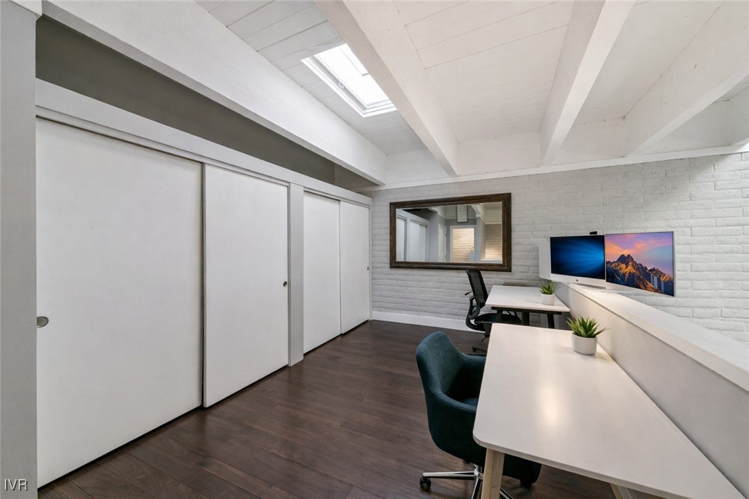 120 Country Club Drive, Unit 3 Incline Village, NV 89451 - Photo 15 of 38 a workspace with furniture wooden floor and a flat screen tv
