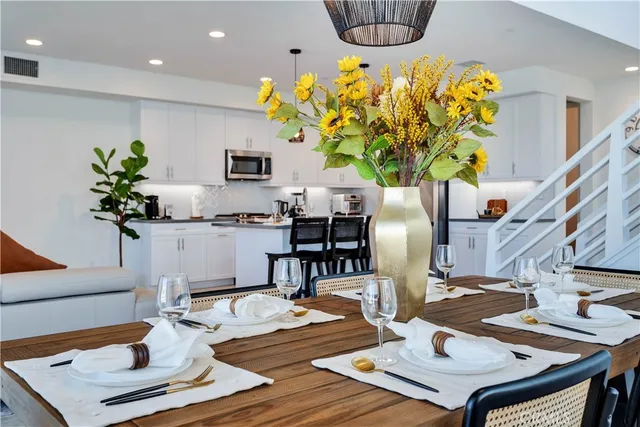 a vase of flowers sitting on a table