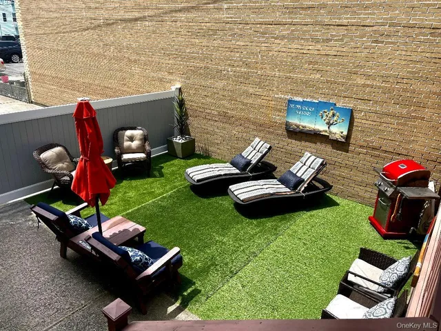 a view of yard from outdoor seating
