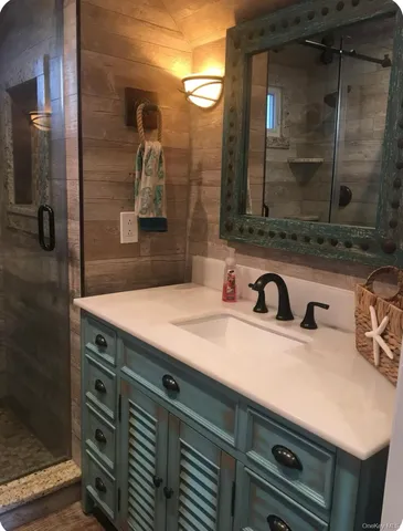 a bathroom with a sink and a mirror