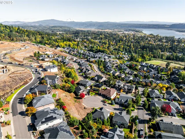an aerial view of residential house with parking space