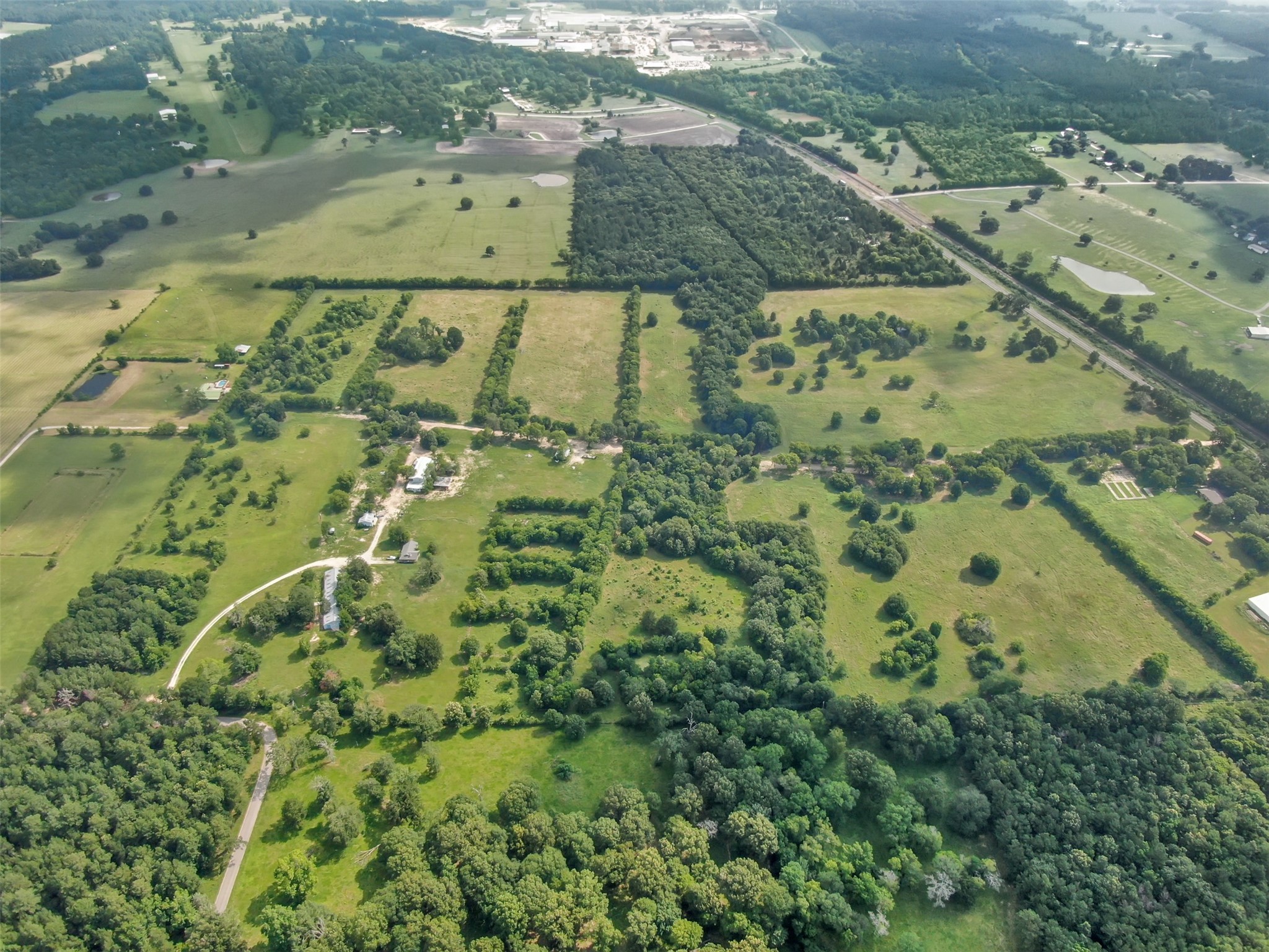 880 Tafelski Road New Waverly, TX 77358 - Photo 23 of 29 an aerial view of a yard with houses