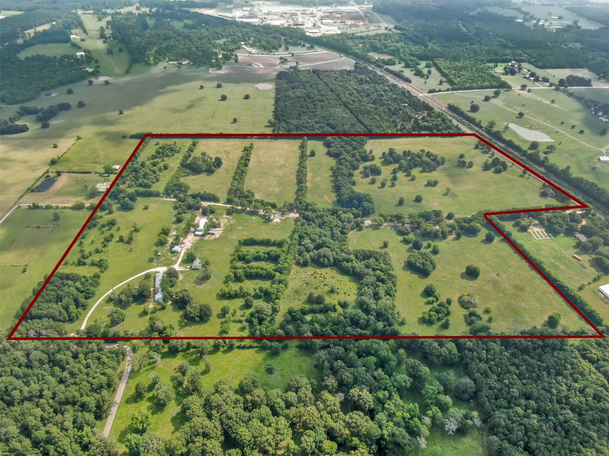 880 Tafelski Road New Waverly, TX 77358 - Photo 24 of 29 an aerial view of a residential houses with outdoor space