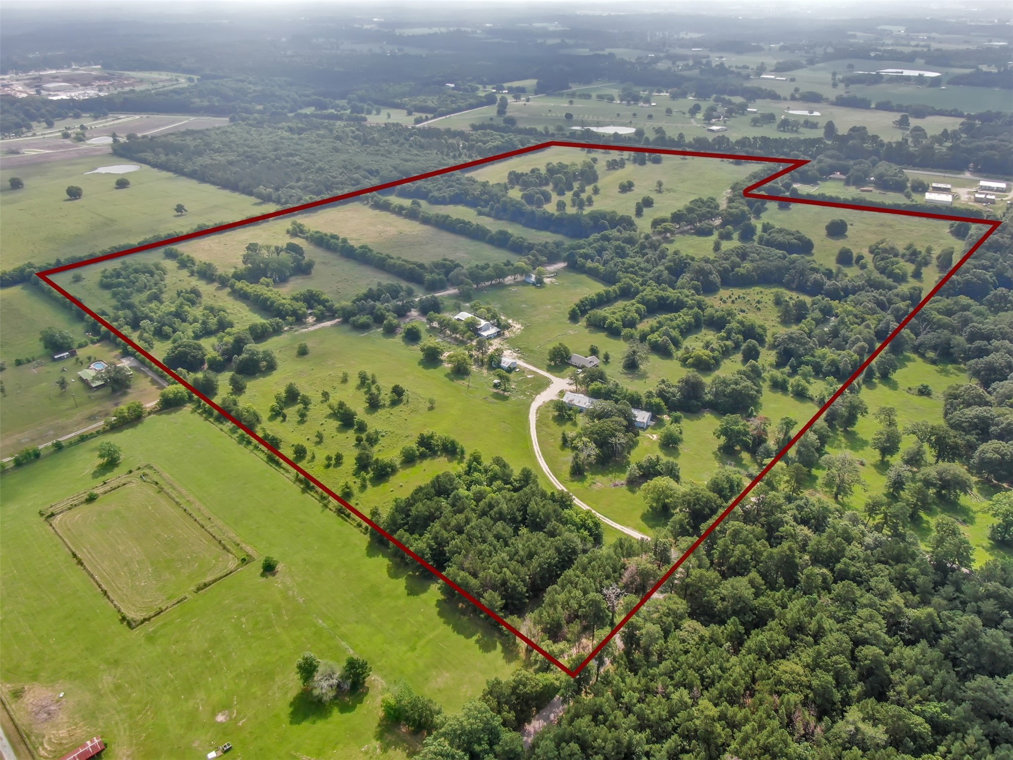 880 Tafelski Road New Waverly, TX 77358 - Photo 26 of 29 an aerial view of a houses with a yard