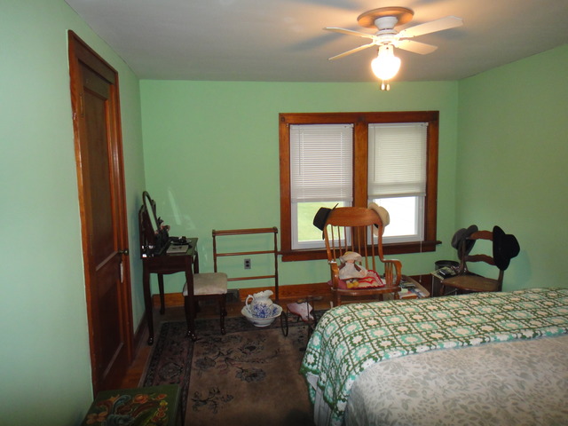13592 Waterman Road Waterman, IL 60556 - Photo 14 of 22 a living room with furniture and a window