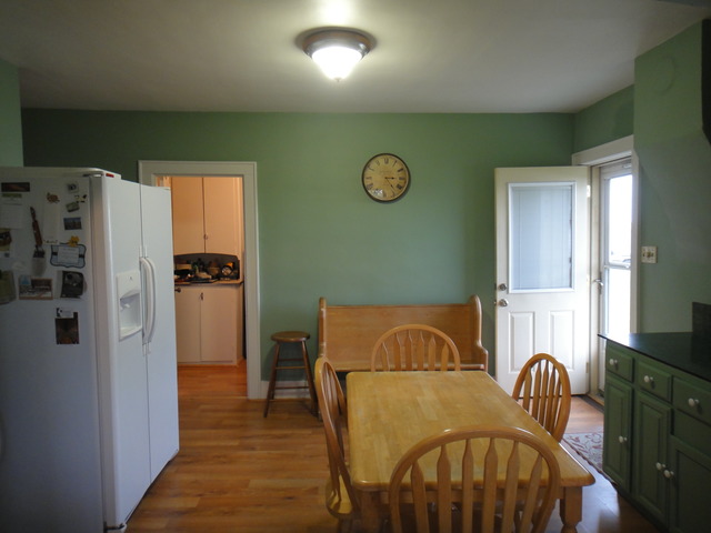 13592 Waterman Road Waterman, IL 60556 - Photo 5 of 22 a view of kitchen and dining area with a sink