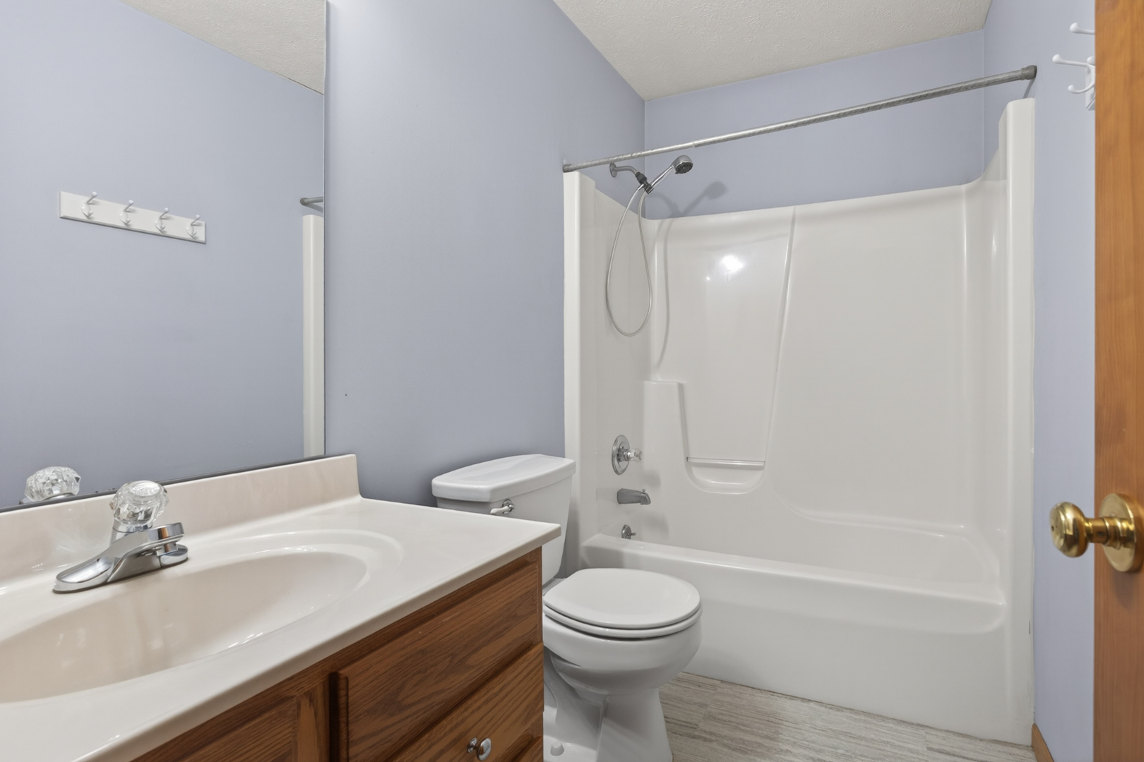 1503 Broad Creek Road Bloomington, IL 61704 - Photo 21 of 31 a bathroom with a sink a toilet and shower