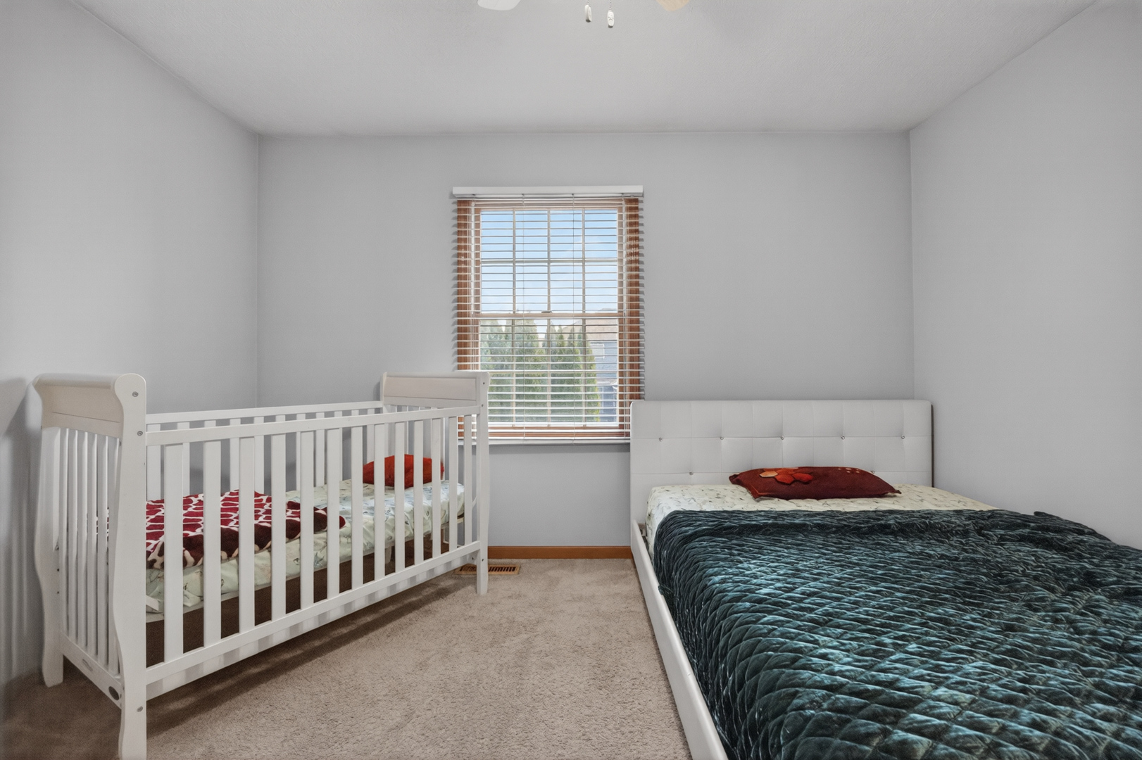 1503 Broad Creek Road Bloomington, IL 61704 - Photo 23 of 31 a bedroom with a bed and window