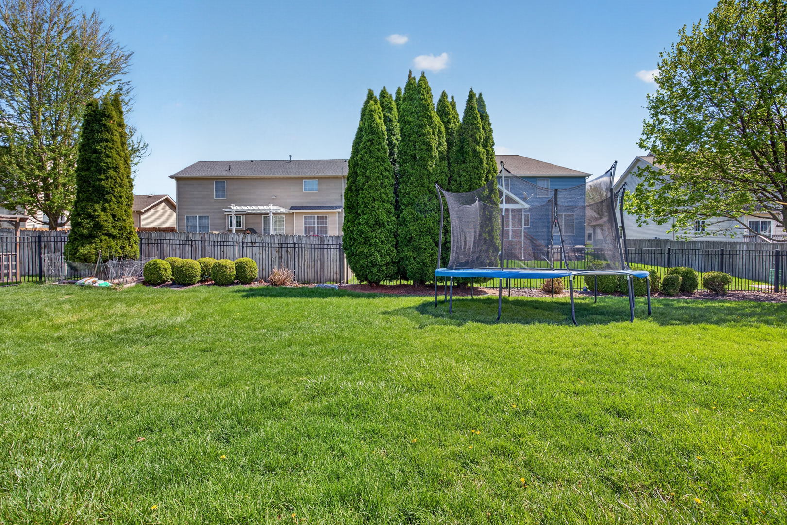 1503 Broad Creek Road Bloomington, IL 61704 - Photo 29 of 31 a view of a house with backyard and a garden