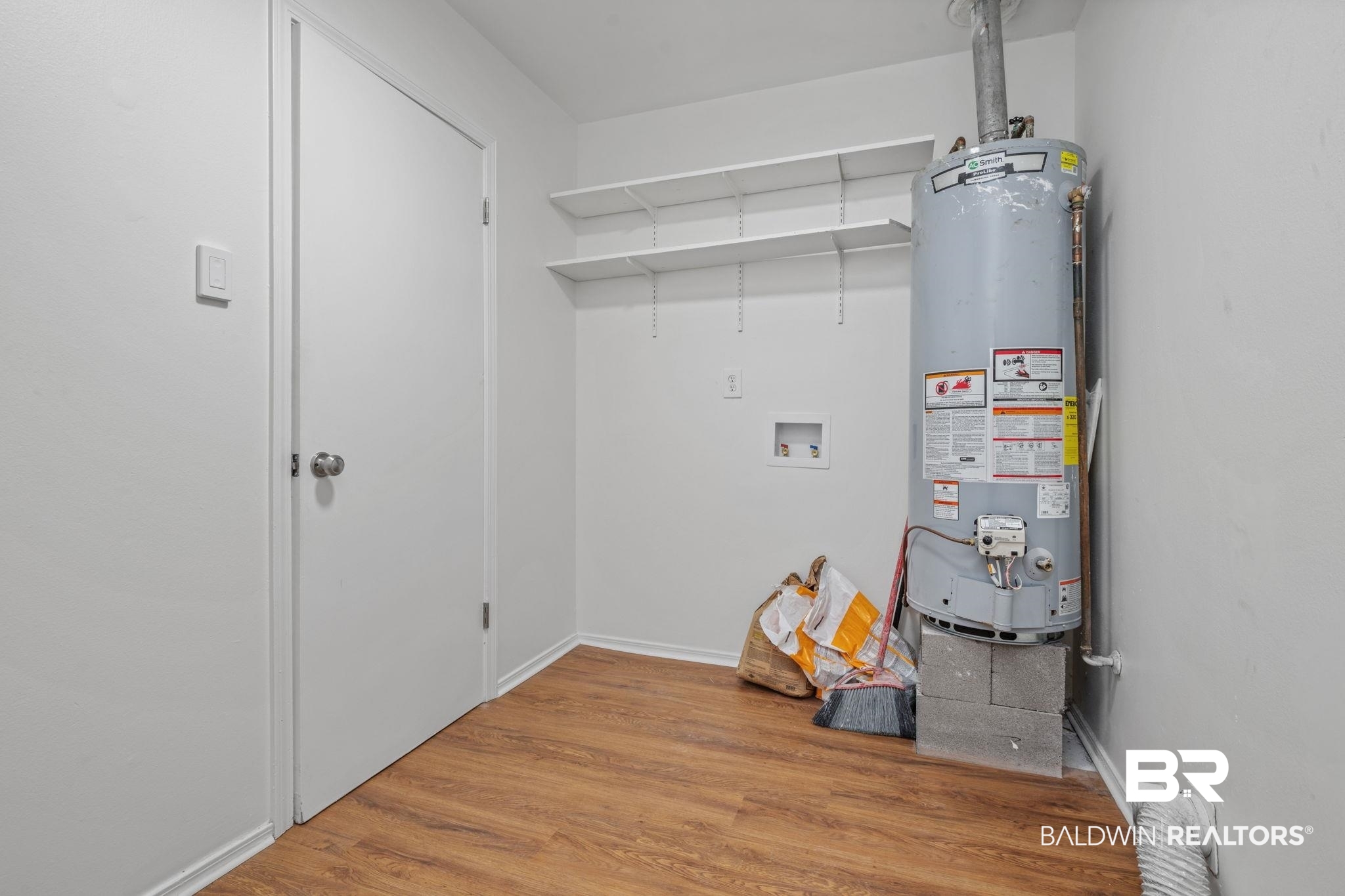5734 Pheasant Court Theodore, AL 36582 - Photo 18 of 23 Utilities featuring water heater