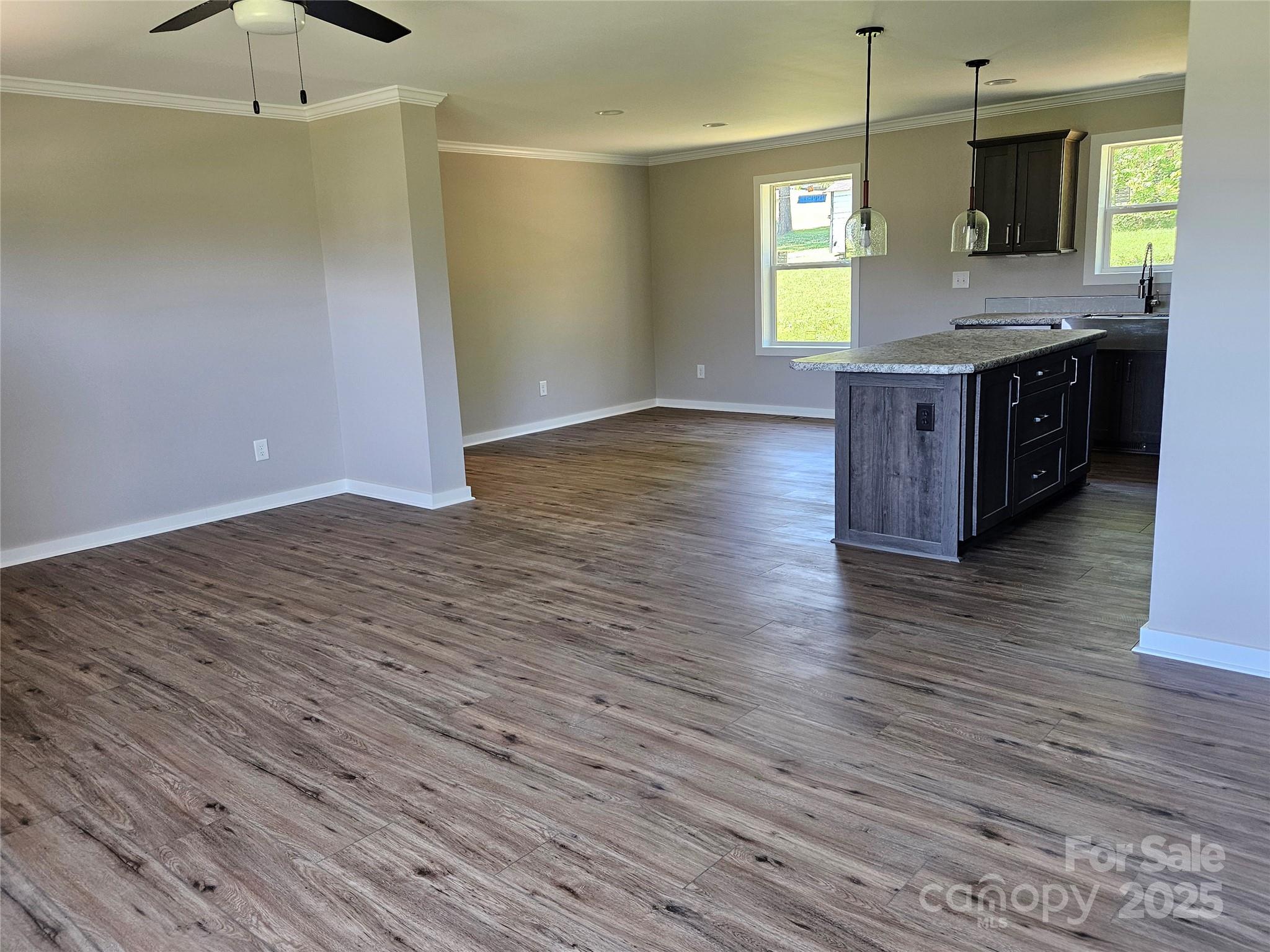 784 Severt Circle Lenoir, NC 28645 - Photo 14 of 41 a kitchen with a wooden floor and window