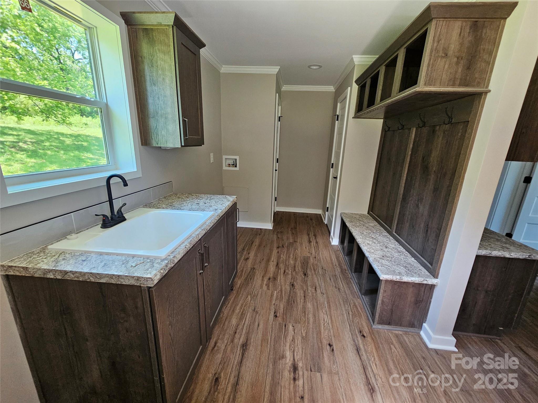 784 Severt Circle Lenoir, NC 28645 - Photo 15 of 41 a bathroom with a sink a mirror and shower