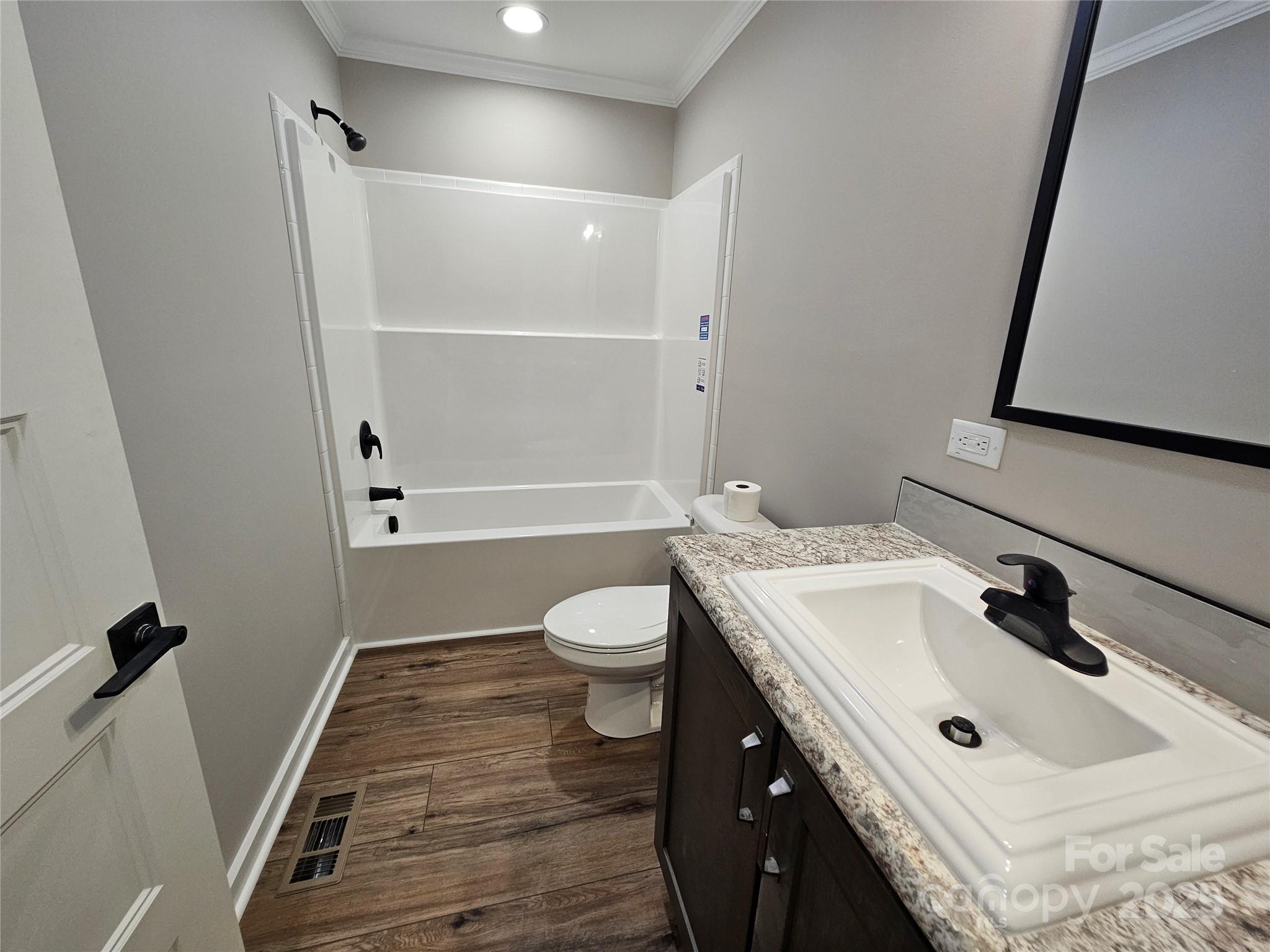 784 Severt Circle Lenoir, NC 28645 - Photo 22 of 41 a bathroom with a sink a toilet and shower