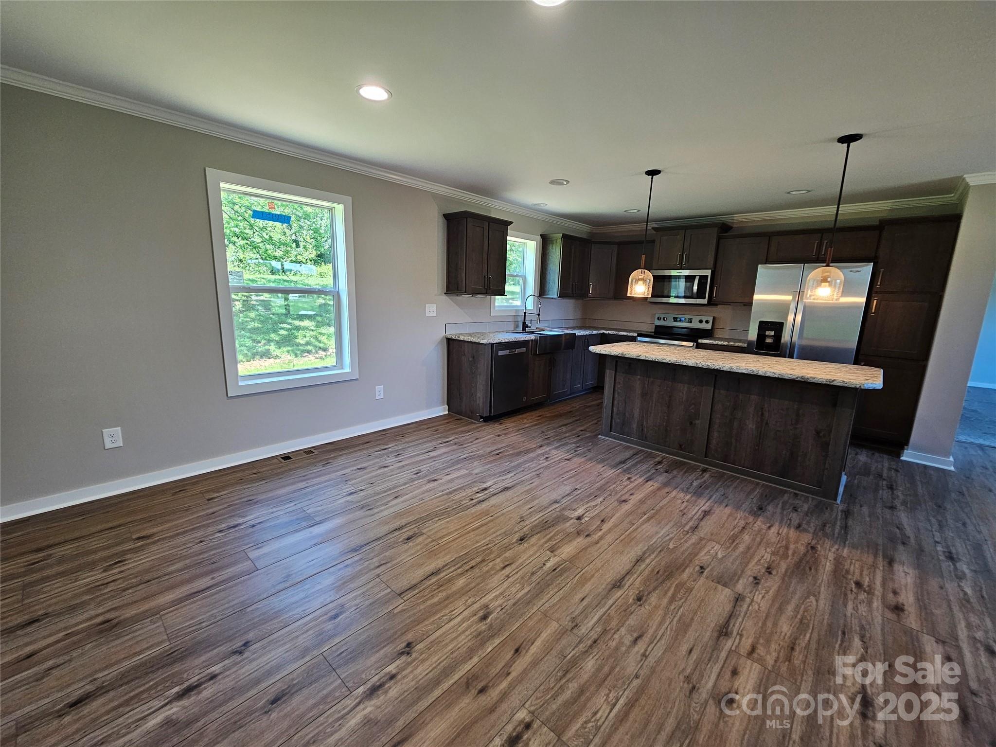784 Severt Circle Lenoir, NC 28645 - Photo 23 of 41 a living room with furniture and a wooden floor
