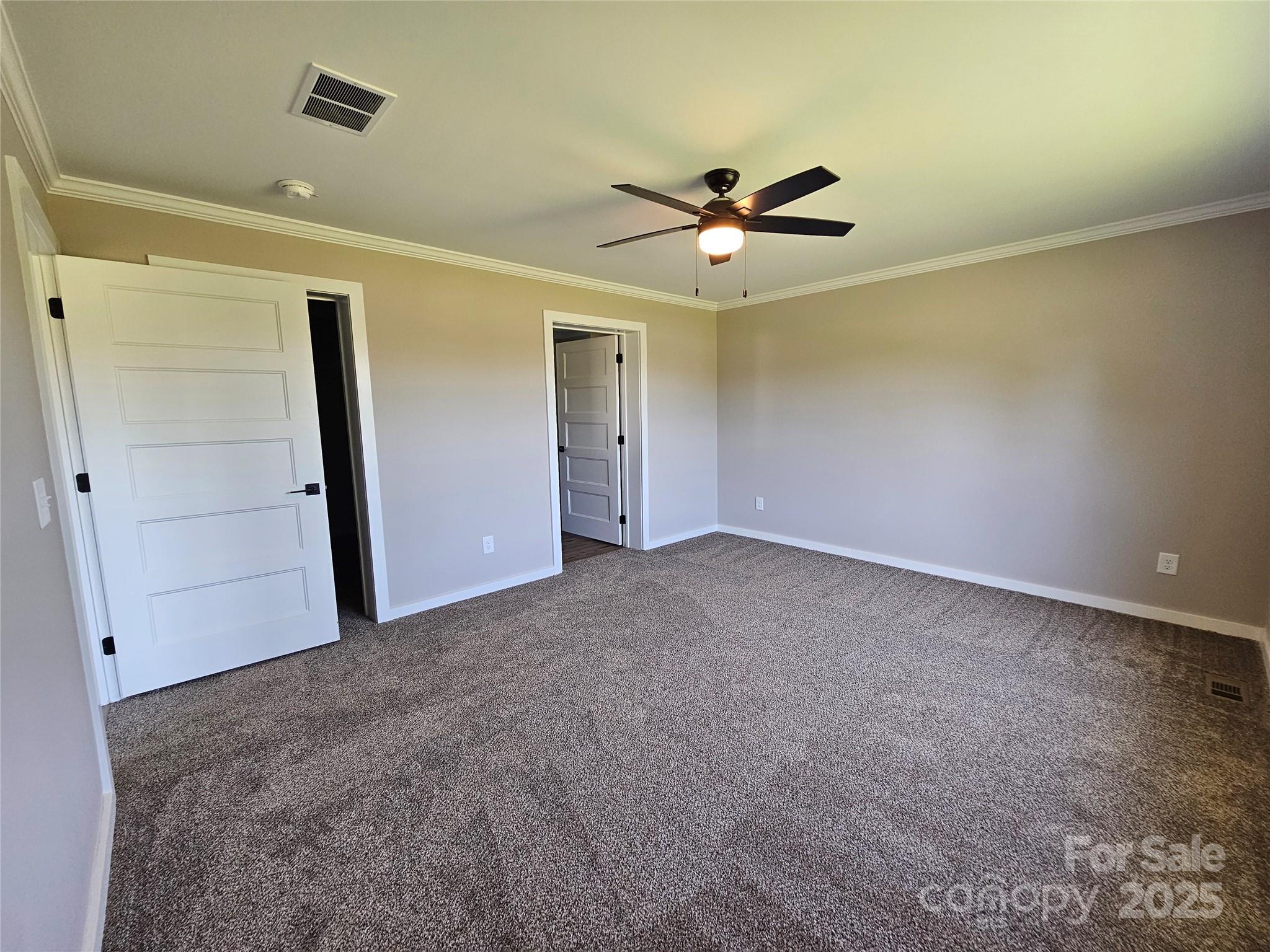 784 Severt Circle Lenoir, NC 28645 - Photo 24 of 41 an empty room with closet and windows