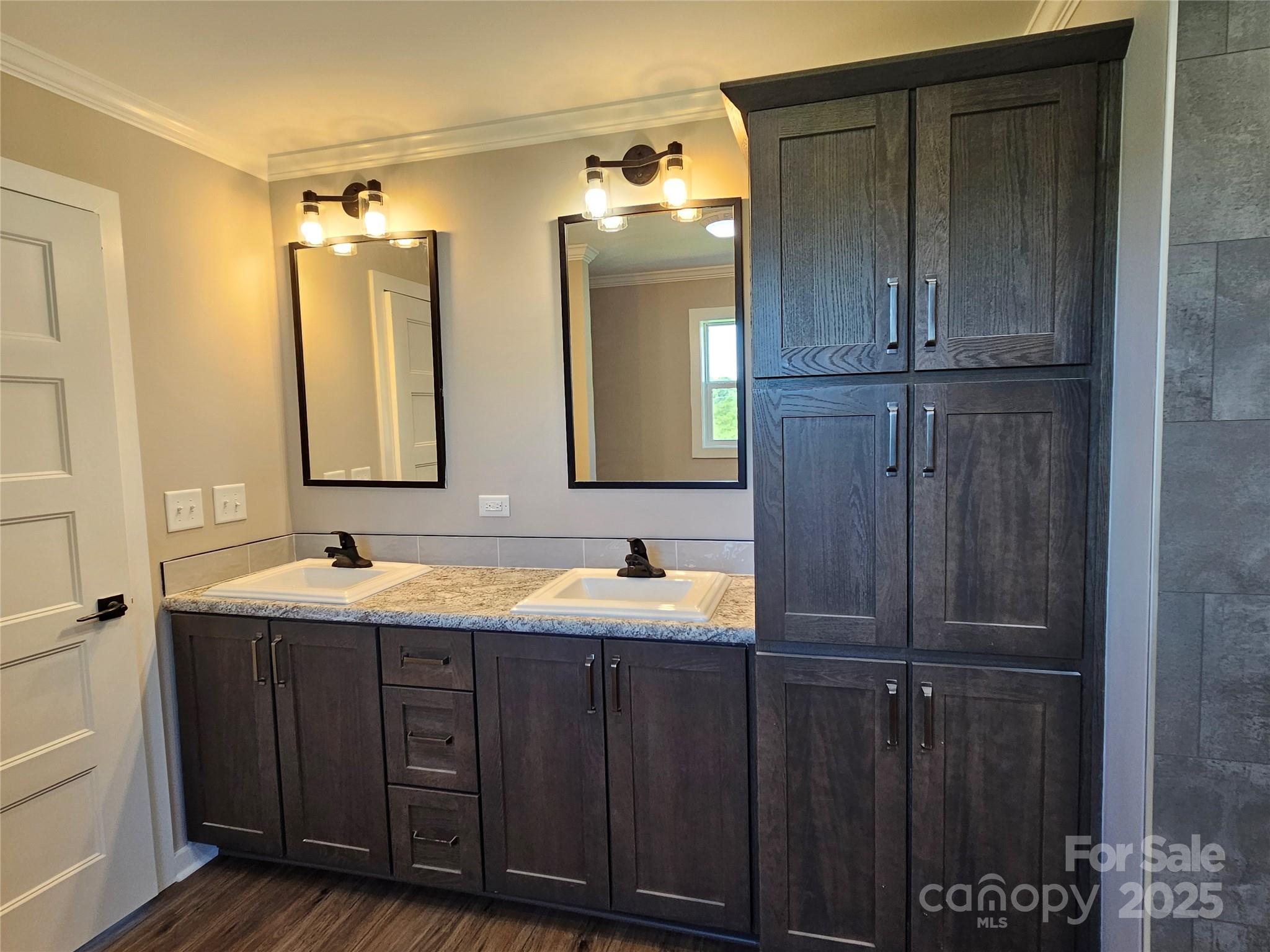 784 Severt Circle Lenoir, NC 28645 - Photo 29 of 41 a bathroom with a double vanity sink and mirror