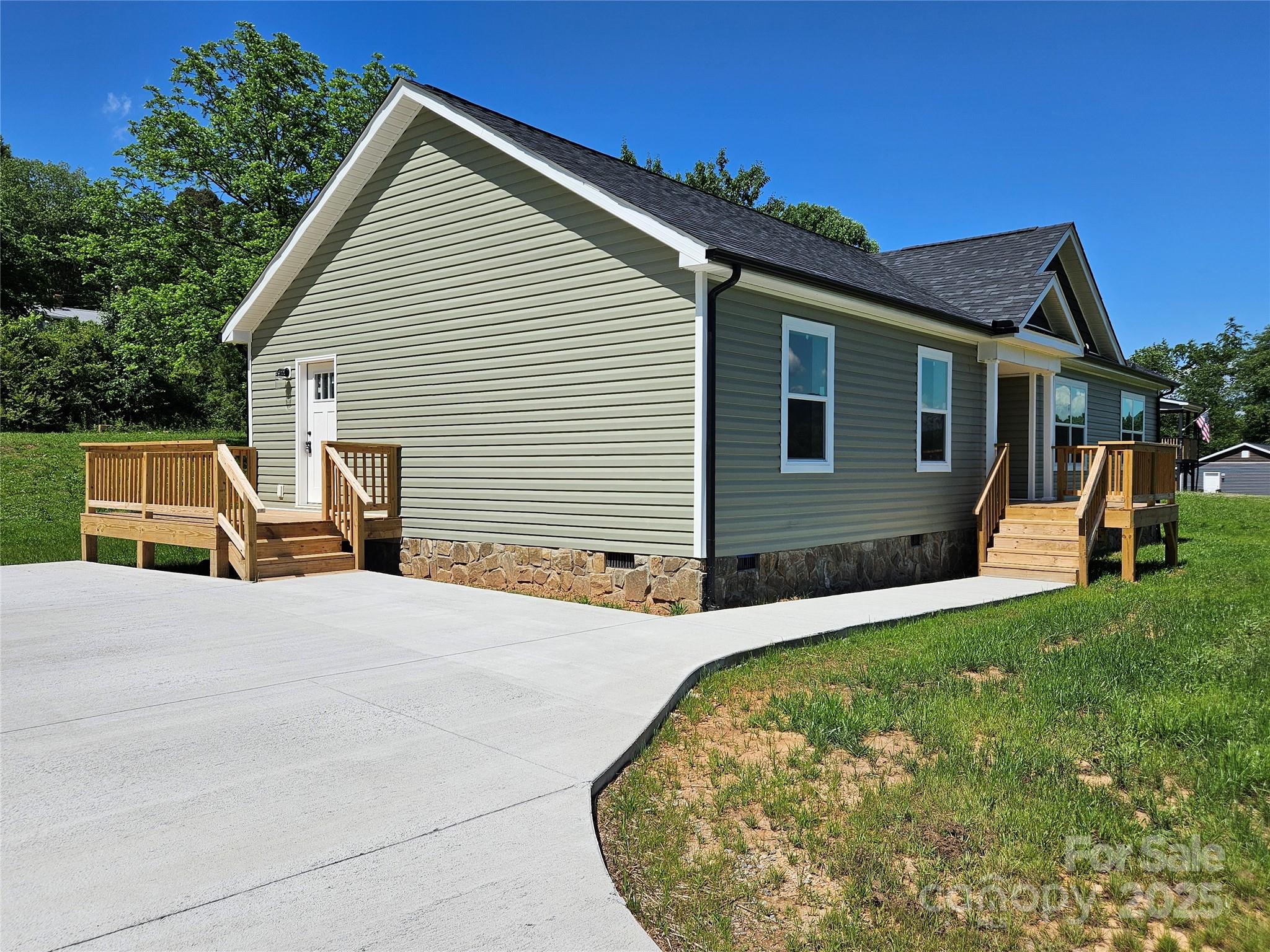 784 Severt Circle Lenoir, NC 28645 - Photo 4 of 41 a view of a house with backyard