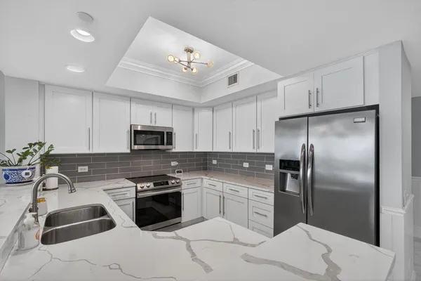 $4,950 | 2650 Lake Shore Drive, Unit 2303, Riviera Beach, FL 33404