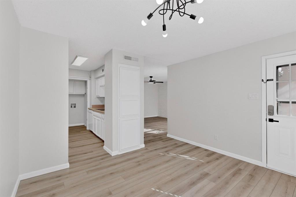 2018 Warnford Place Arlington, TX 76015 - Photo 10 of 34 a view of empty room with wooden floor