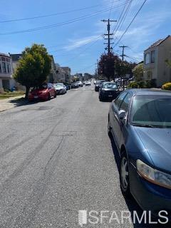 120 Rolph Street San Francisco, CA 94112 - Photo 5 of 6 a view of a car garage with cars