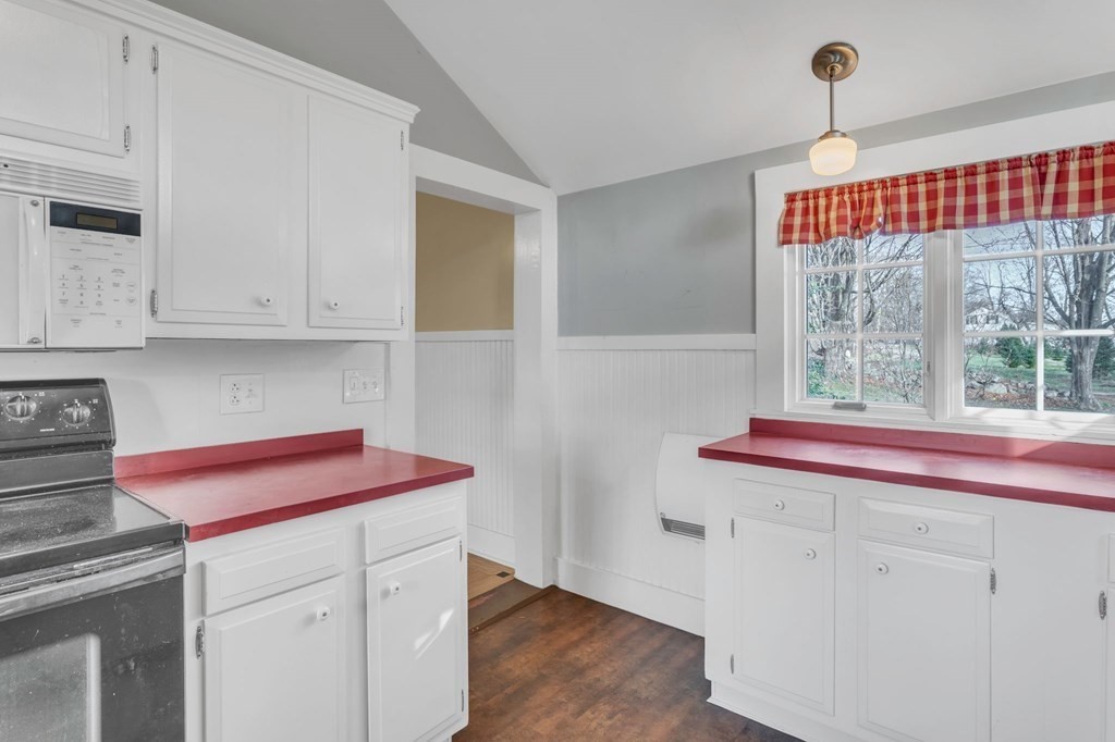 9 N Road Westfield, MA 01085 - Photo 5 of 42 a kitchen with stainless steel appliances granite countertop a sink and a white cabinets