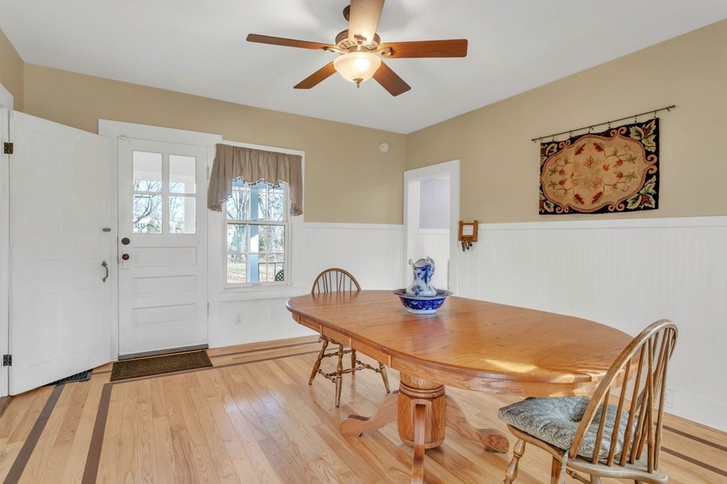 9 N Road Westfield, MA 01085 - Photo 8 of 42 a view of a dining room with furniture and wooden floor