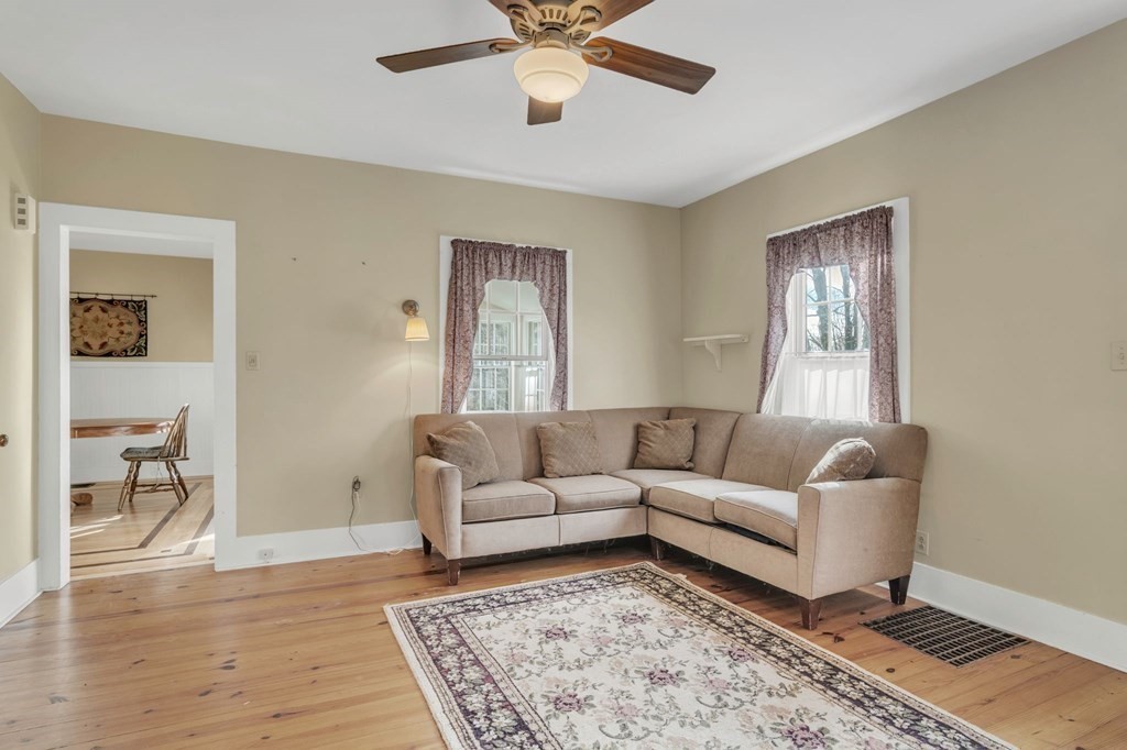 9 N Road Westfield, MA 01085 - Photo 10 of 42 a living room with furniture and a window